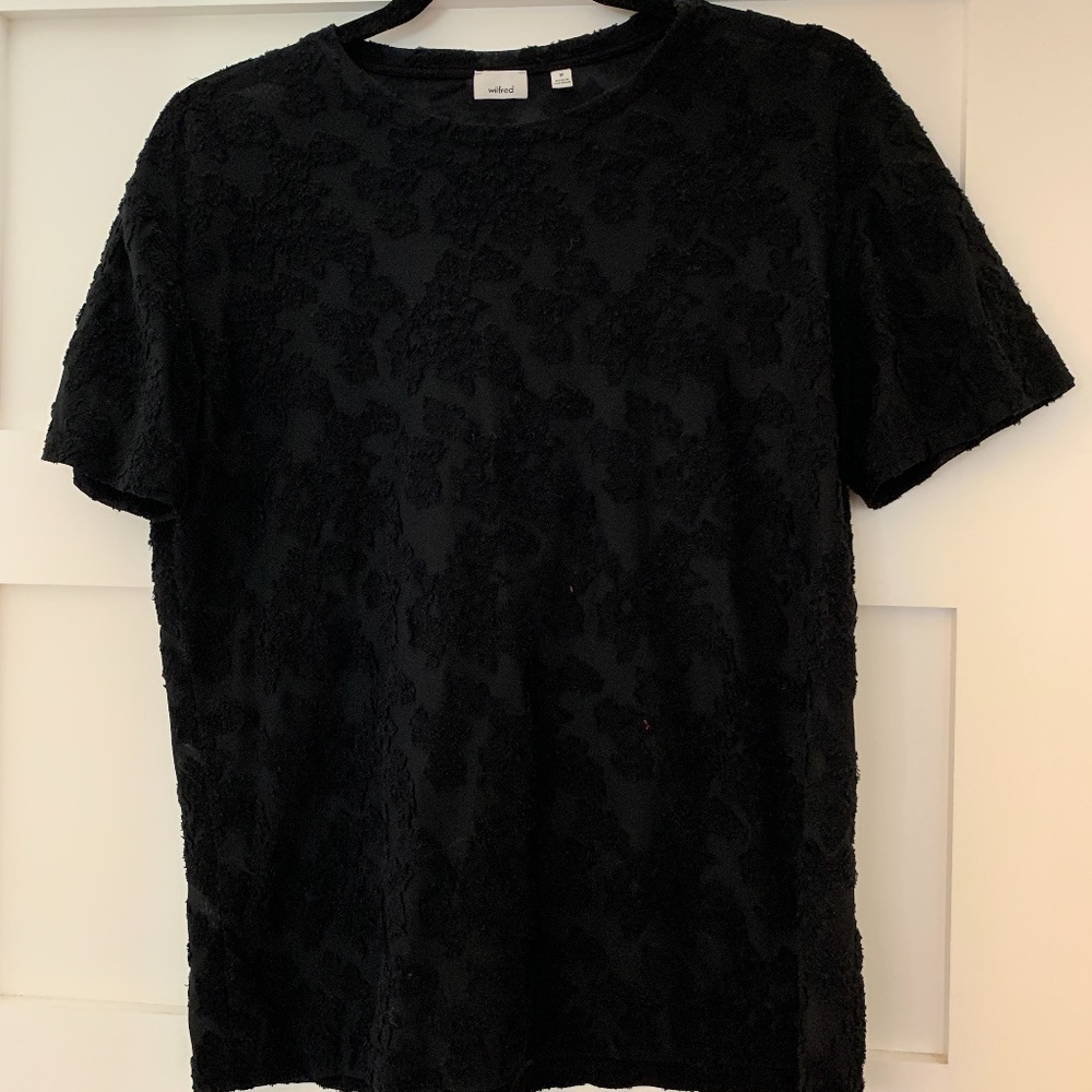 Black top with floral velvet details